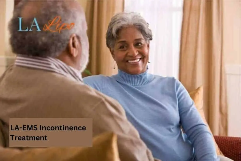 Couple sat smiling at each other - LA-EMS treatment Ham